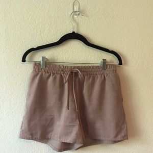 Beige sheer, silky drawstring shorts